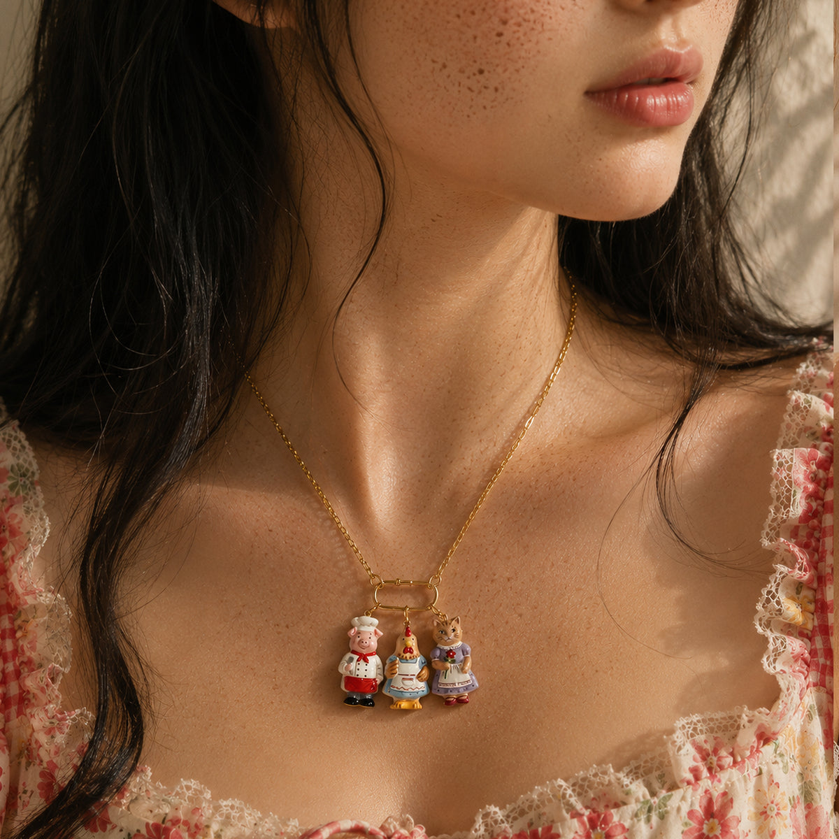 Animal Forest necklace worn with three small character charms on a fine chain.