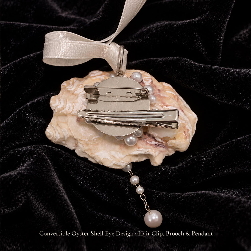 Back of Nyra Lavender Gaze convertible shell jewelry showing the hair clip and brooch fastening.