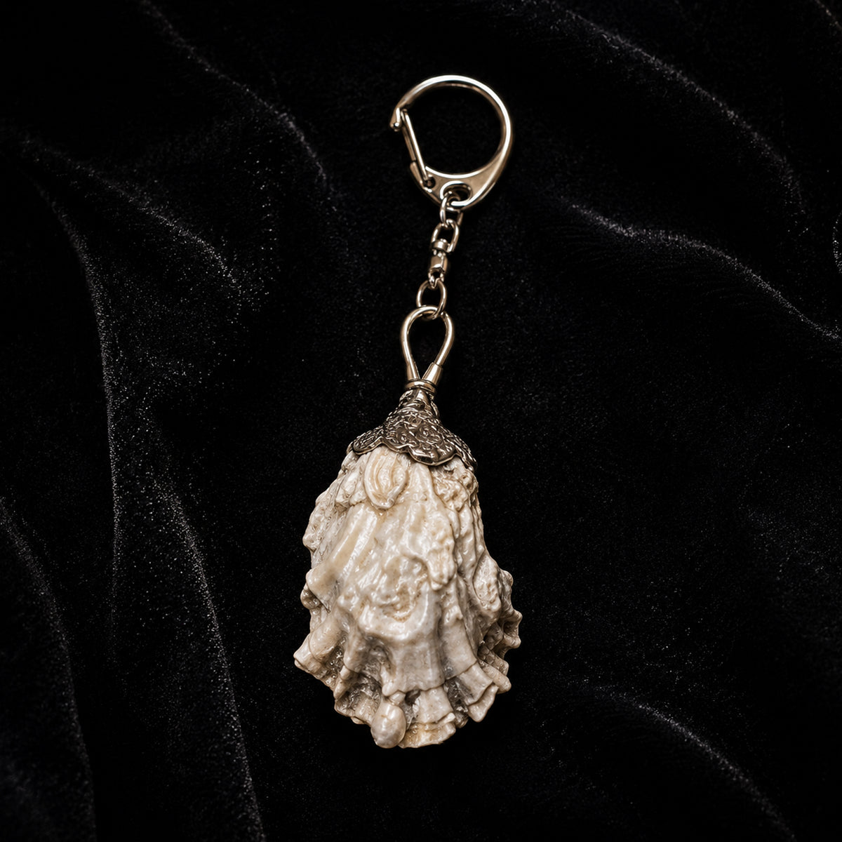 Standard keychain attachment reference; actual Vespera shell may vary