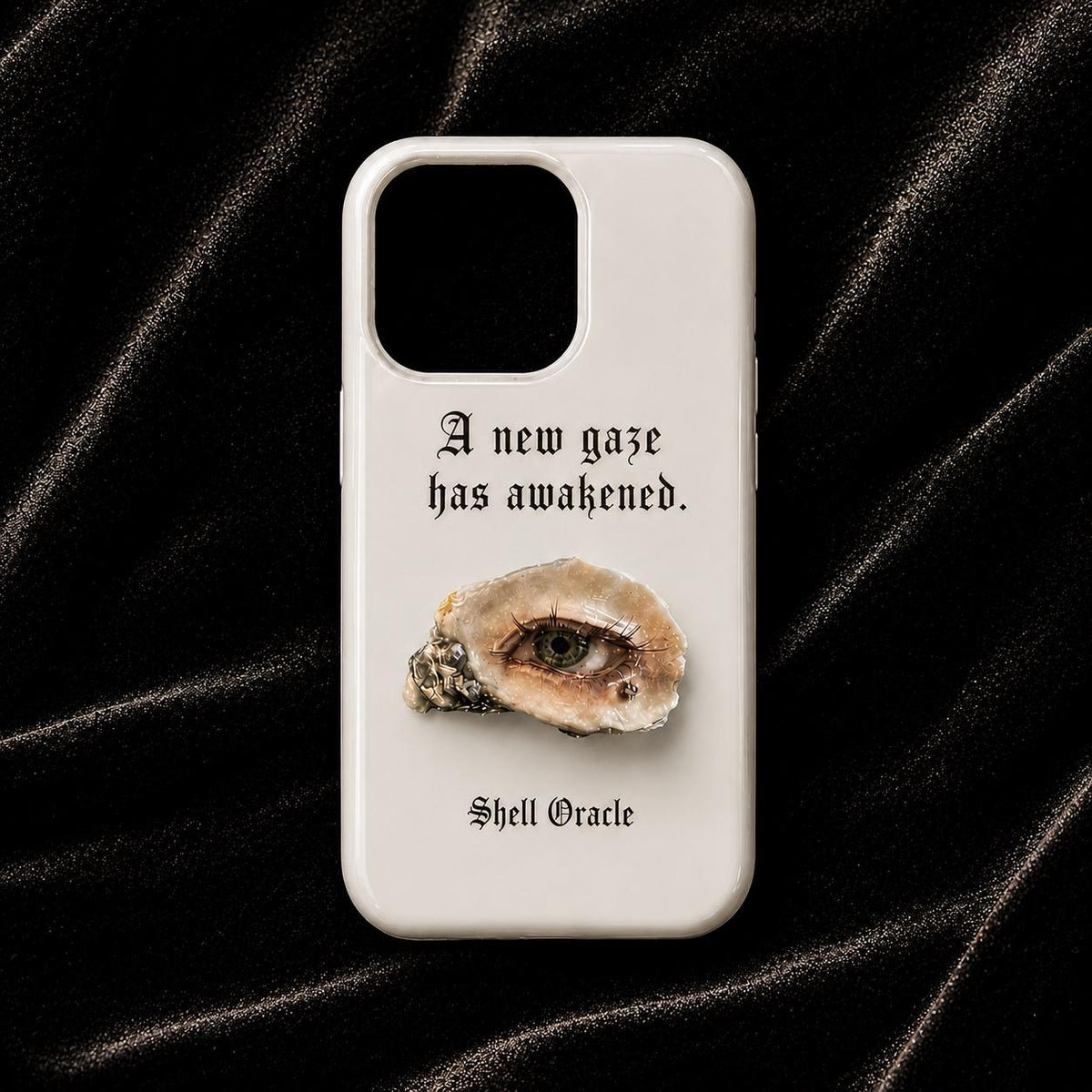 White Shell Oracle phone case with a shell-eye print and dark Gothic lettering.