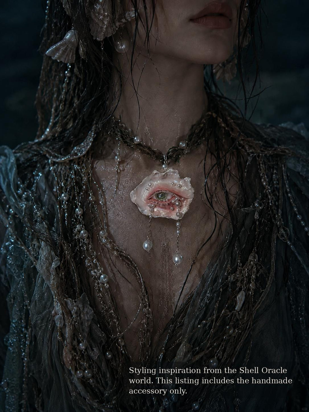 Editorial styling reference showing shell-eye jewelry with a dark green outfit; pictured piece may differ.