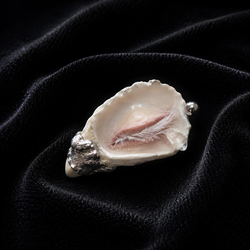 Angled view of Nyra Sleeping Beauty showing the closed eyelid and sculpted shell edge.