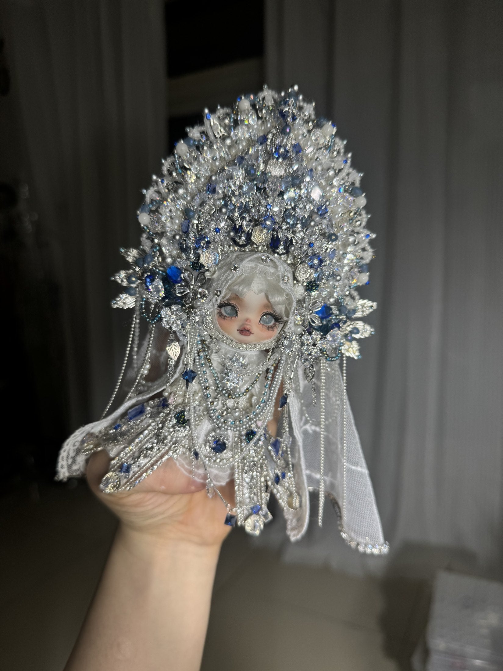 A second view of the blue and silver art doll, archive tuntun-007